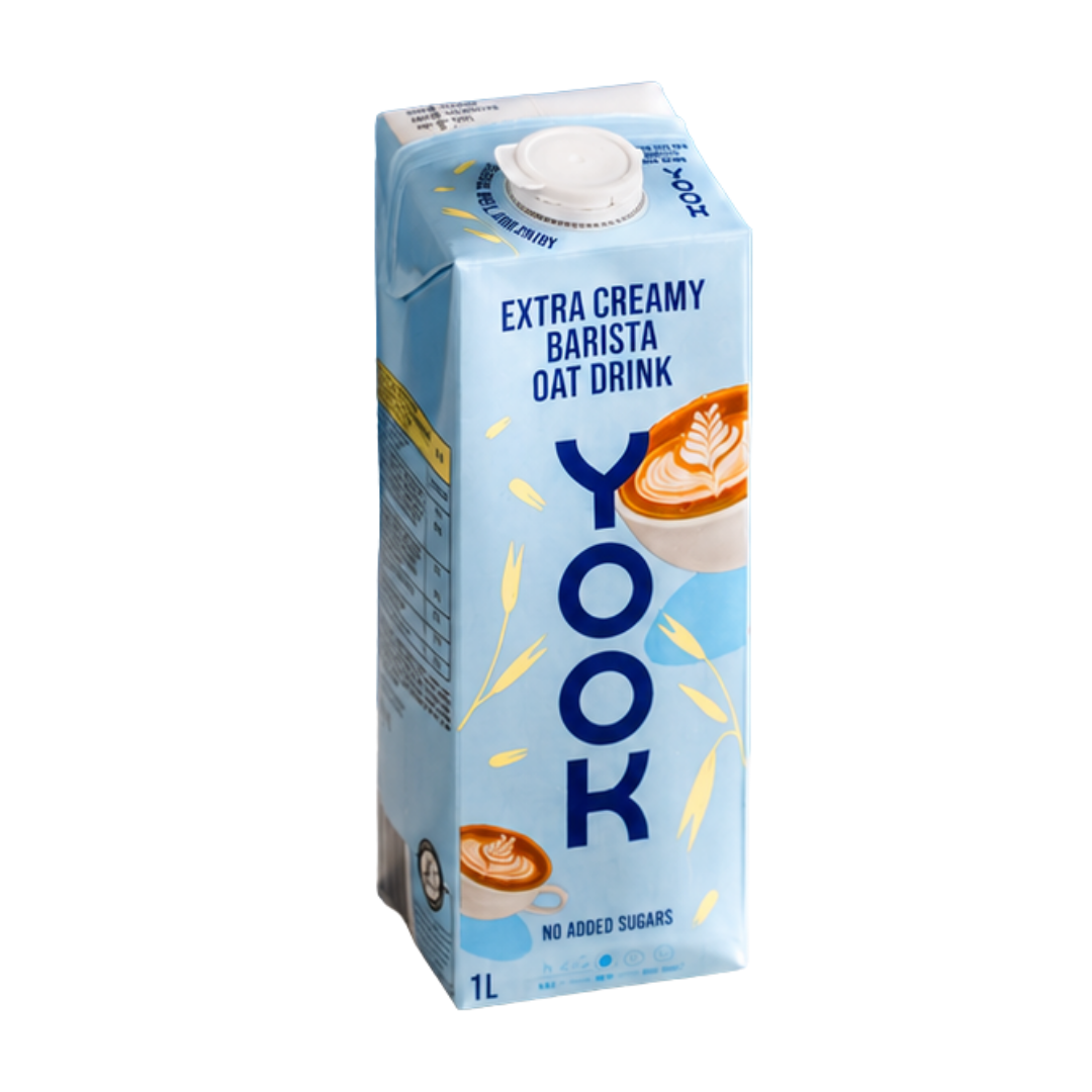 A 1L carton of Yook Extra Creamy Barista Oat Drink on a plain white background. The packaging is light blue with dark blue branding and illustrations of oat flakes and coffee cups.