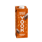 A 1-liter carton of Yook Chocolate Oat Drink on a plain white background. The carton is orange with white text and graphics of chocolate bars and oat leaves.