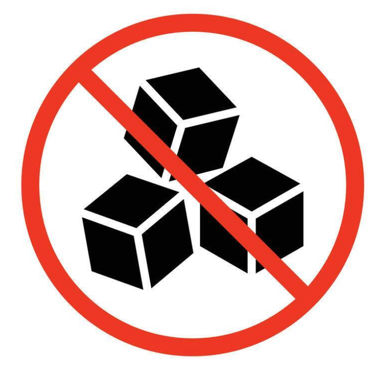 Prohibition sign with black cubes inside a red circle on a white background
